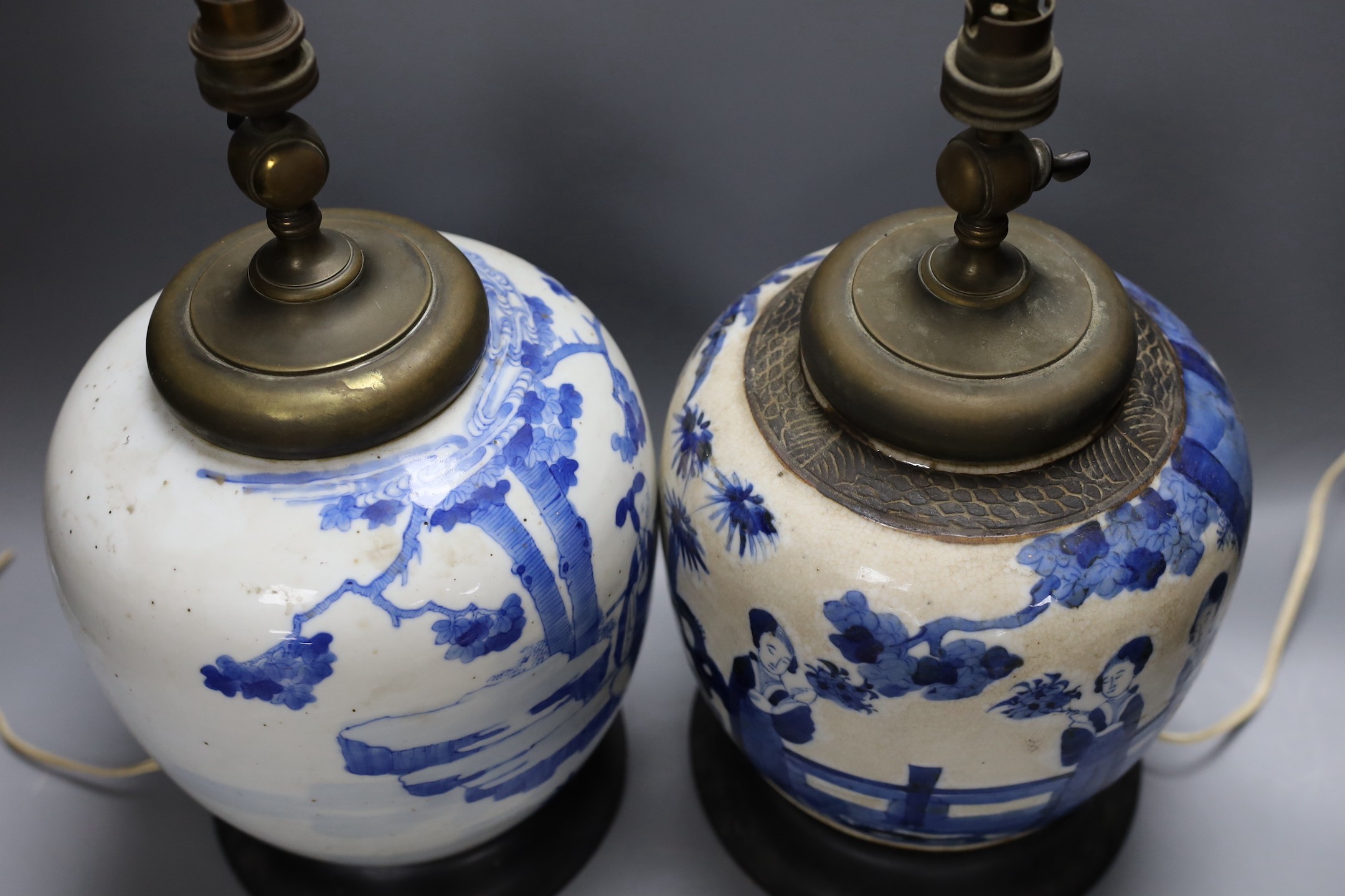 Two 19th century Chinese blue and white jars mounted as lamps, tallest 37cm